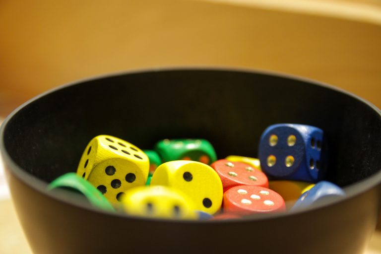 close-up-multi-colored-dice-container (1)